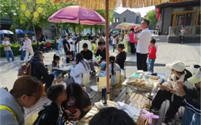 中宏网、天津广播电视台、今晚报发布我校“五一”期间于北塘古镇举办非遗文创市集暨研学体验活动